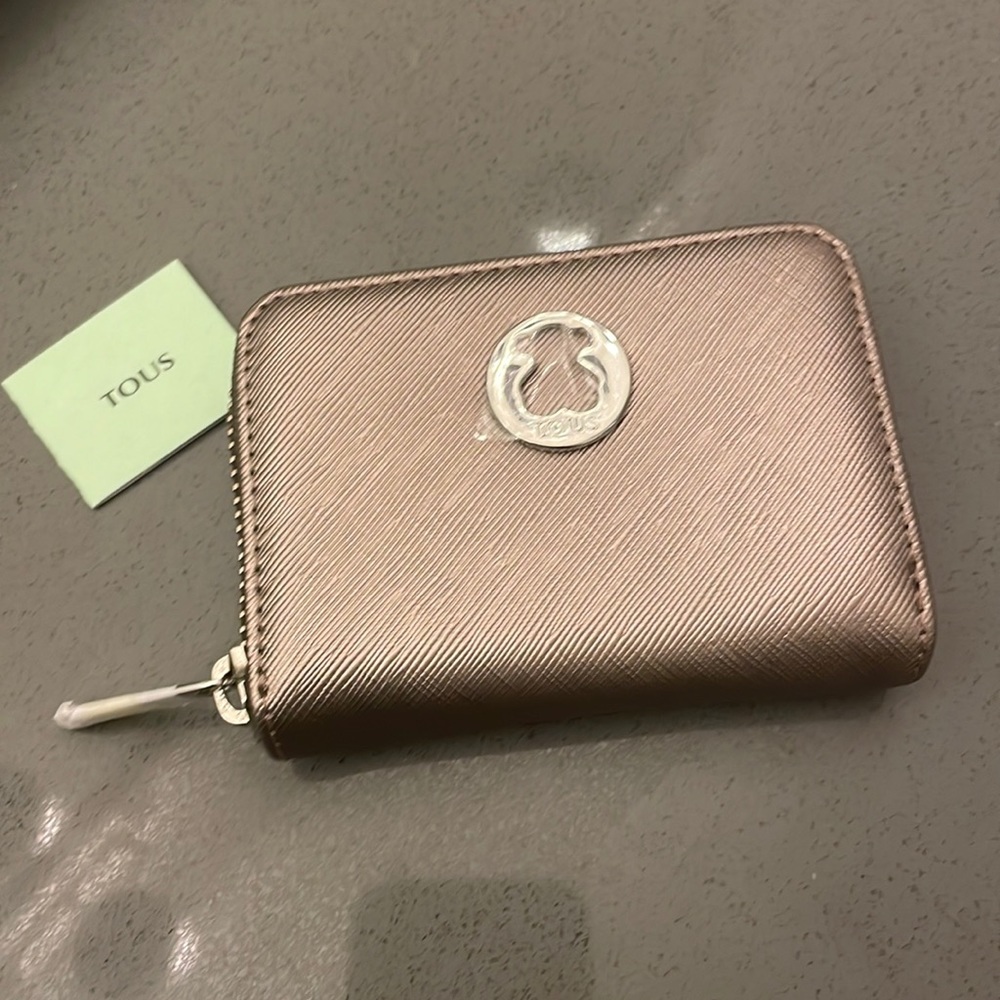 Tous change wallet
